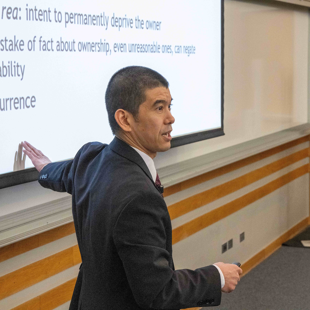 Faculty member teaching in a law classroom